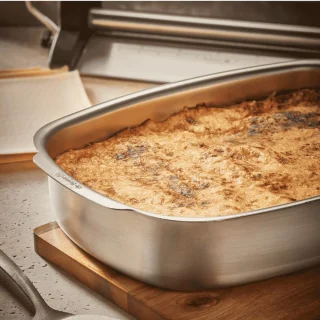 Bandeja rectangular honda para horno de acero inoxidable De Buyer