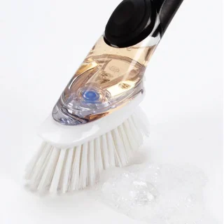 Cepillo con dispensador de jabón OXO