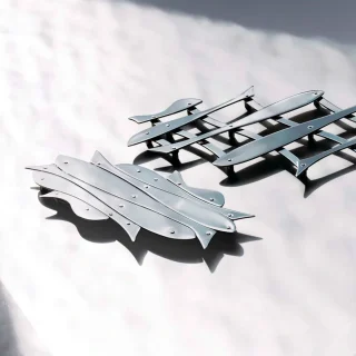 Salvamanteles de acero inoxidable Peschers Alessi